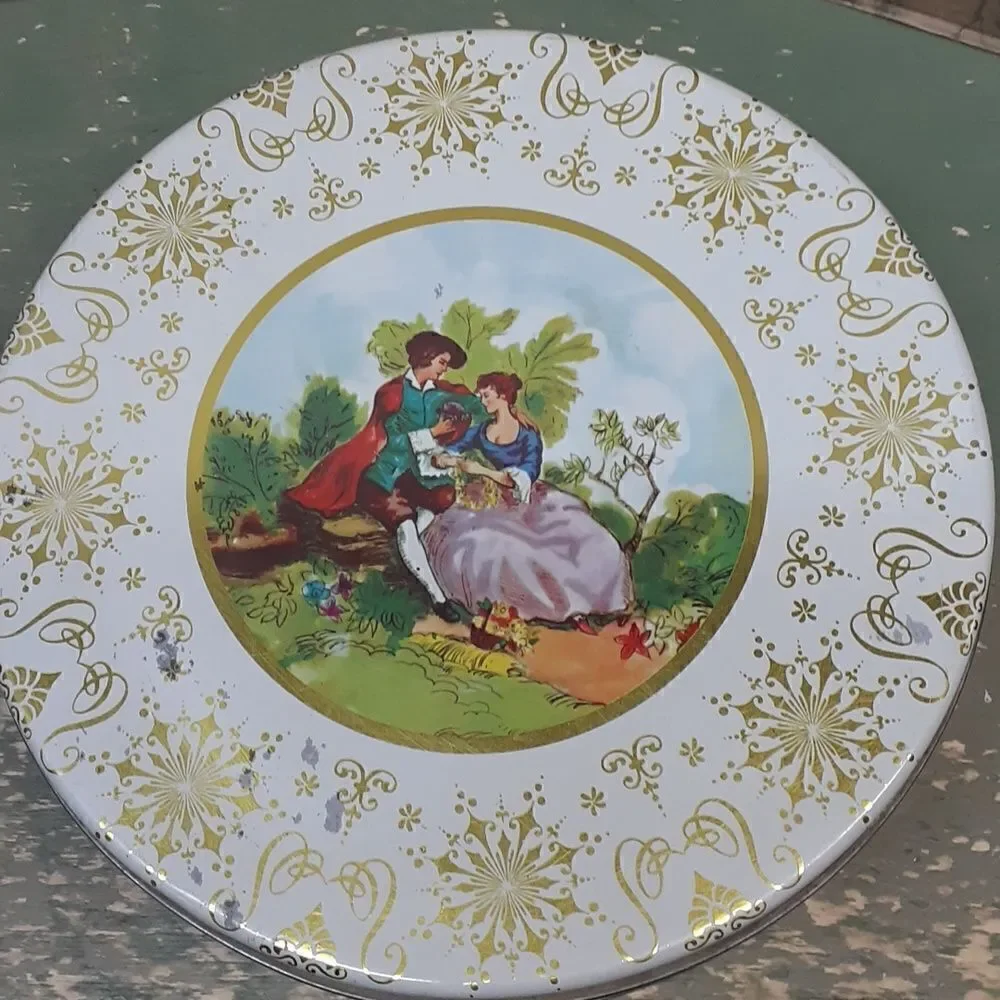 3‎ pc set of vintage round tins featuring elaborate ladies from the past.